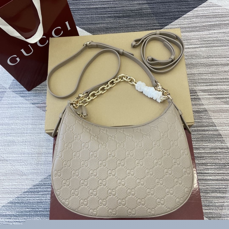 G*u*i top handle bags